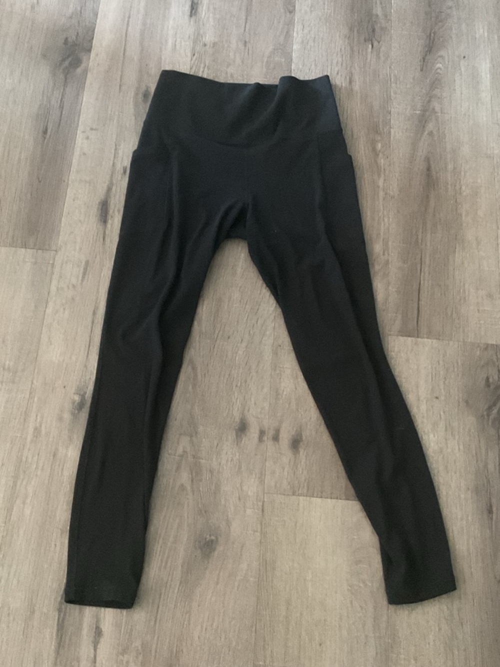 Athleta Black Salutation Stash Pocket II Tight - Logo Detail